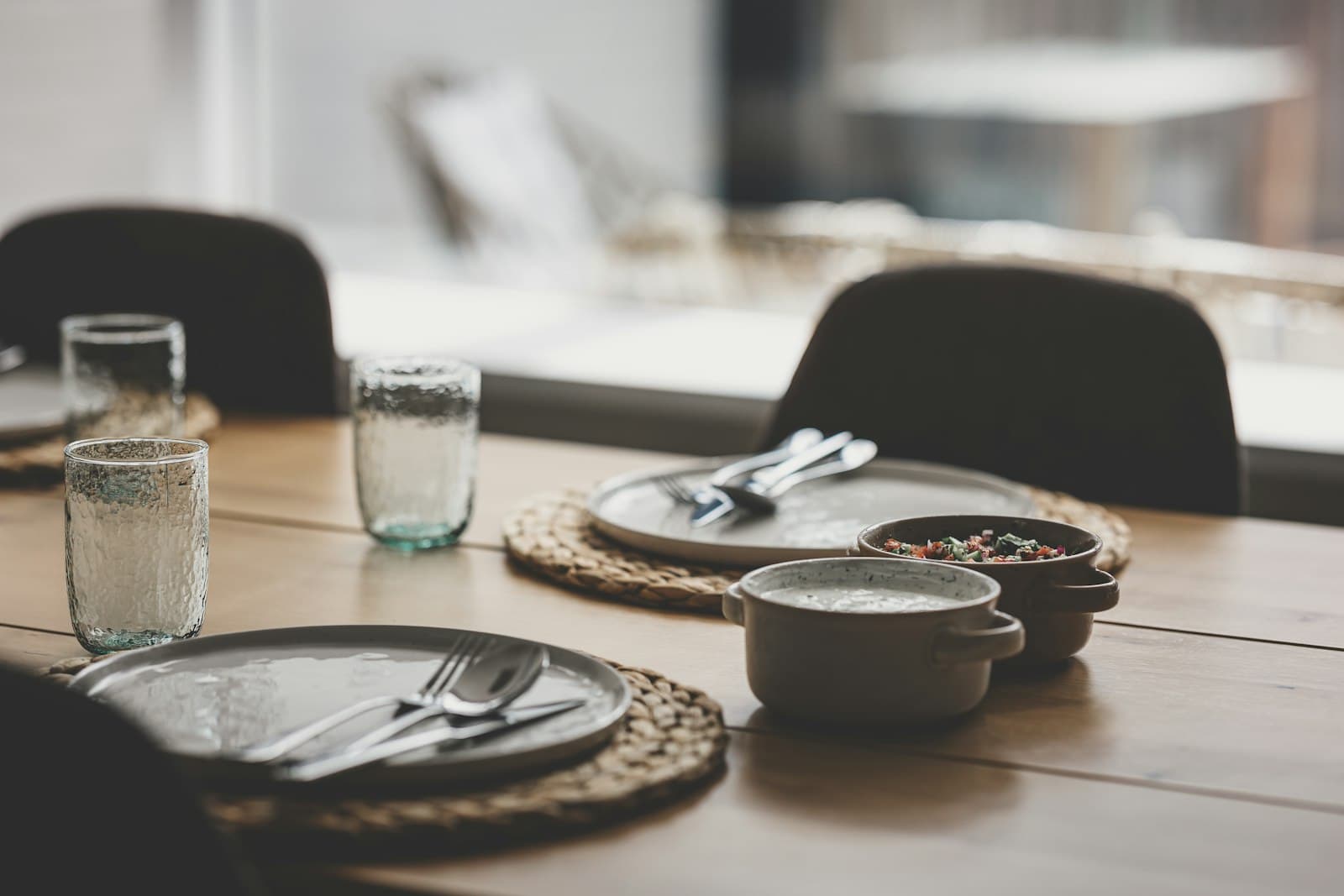Restaurant table set with ceramic plates