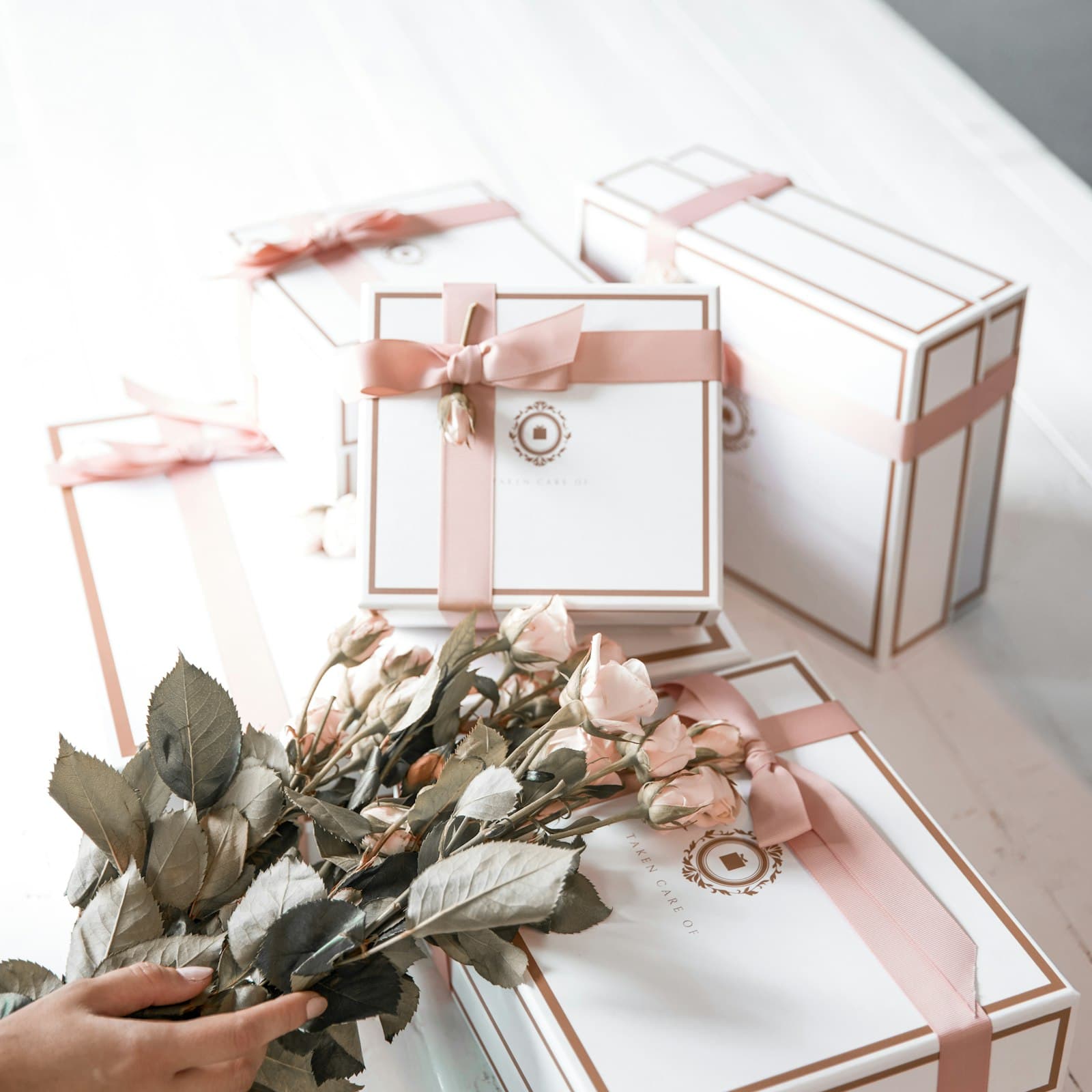 Rigid gift boxes tied with ribbon
