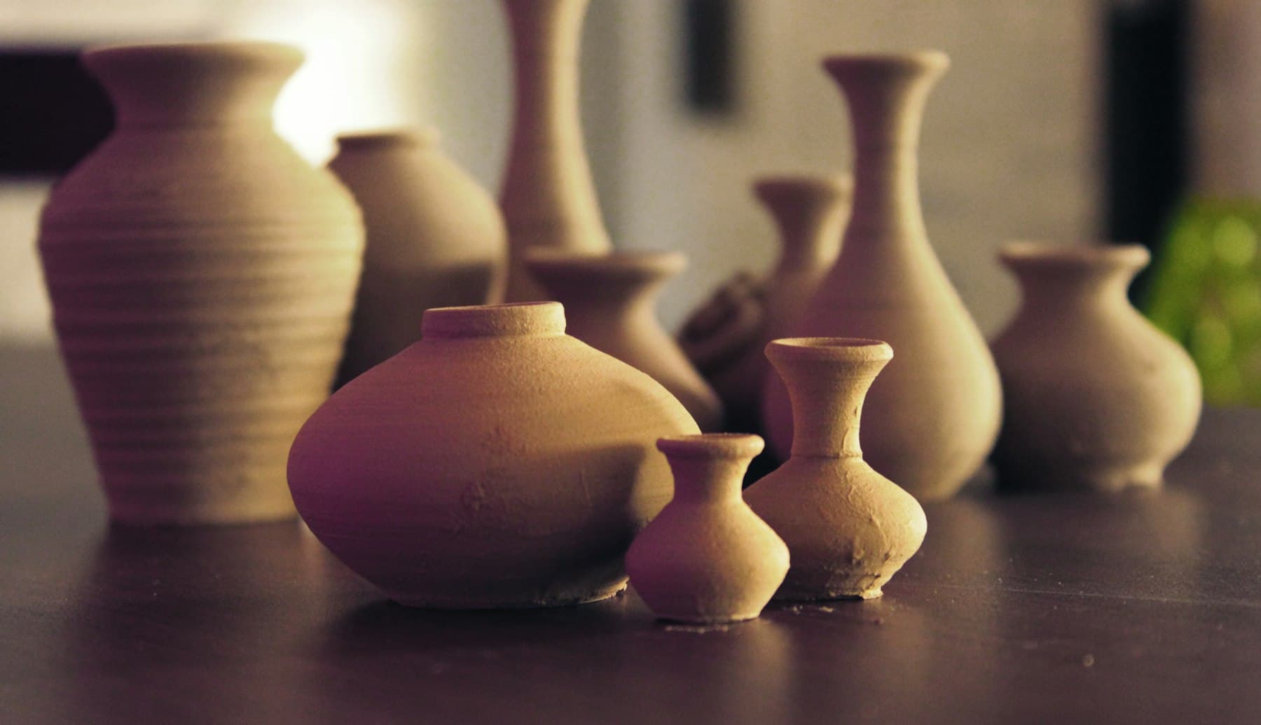Handmade terracotta vases in varied shapes